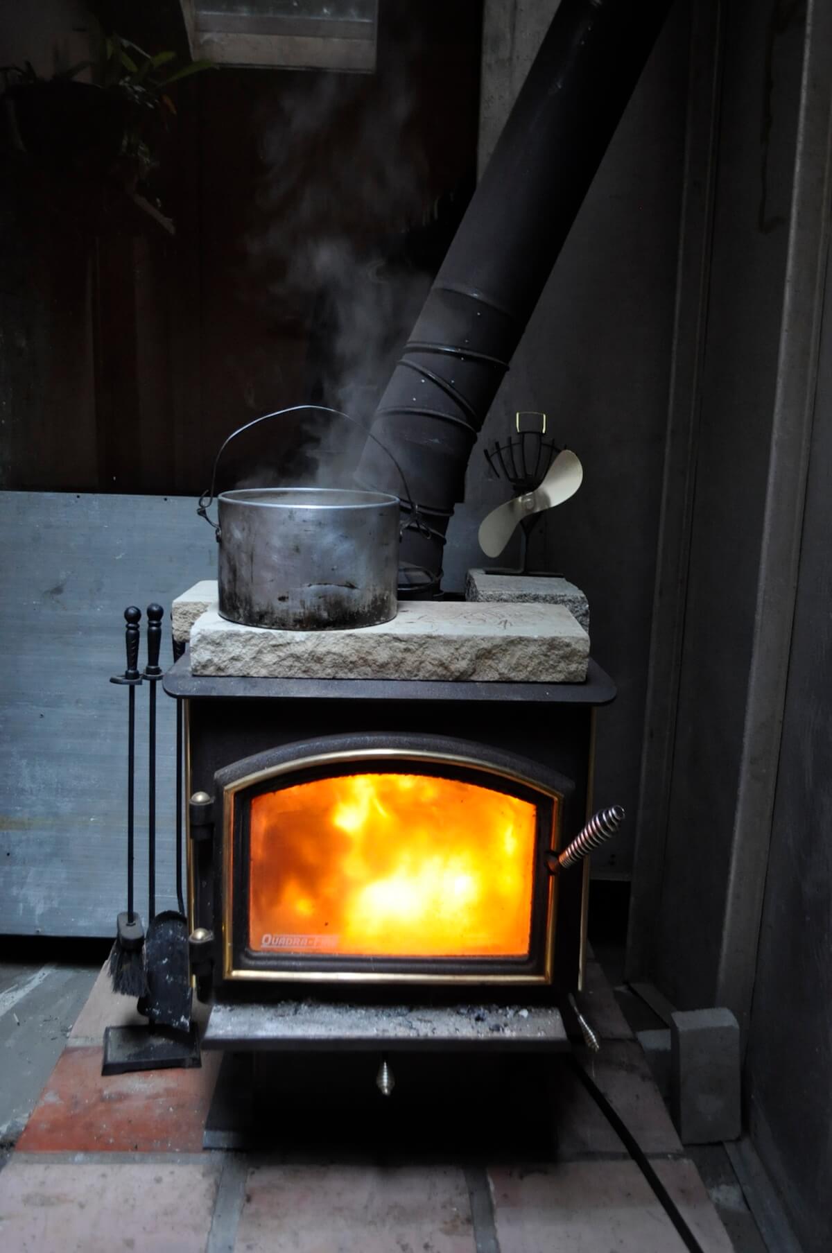 bone broth simmering on stove