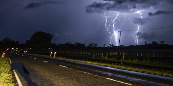 thunder and lightning storm near road