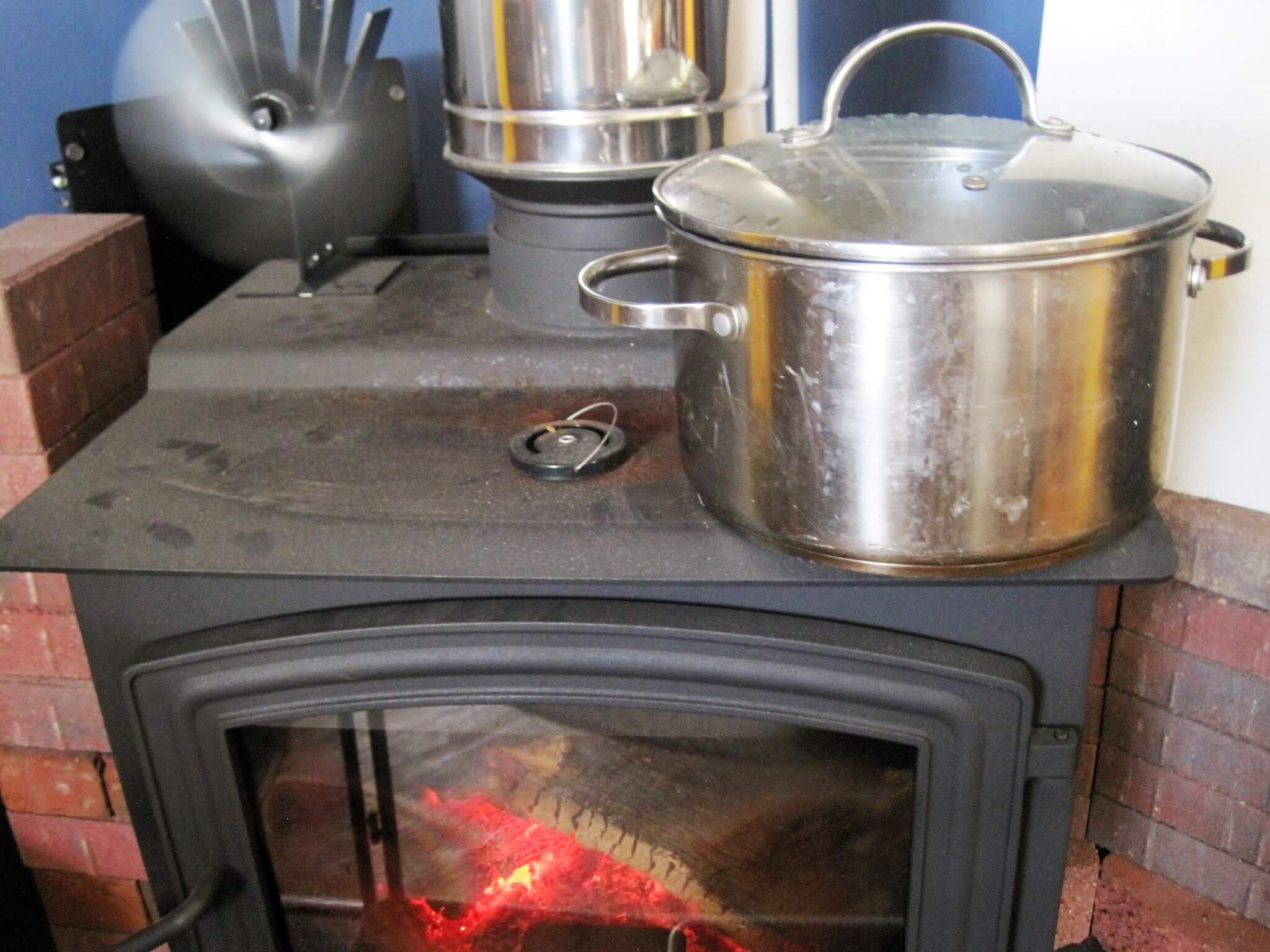 pot leaching acorns on wood burning stove