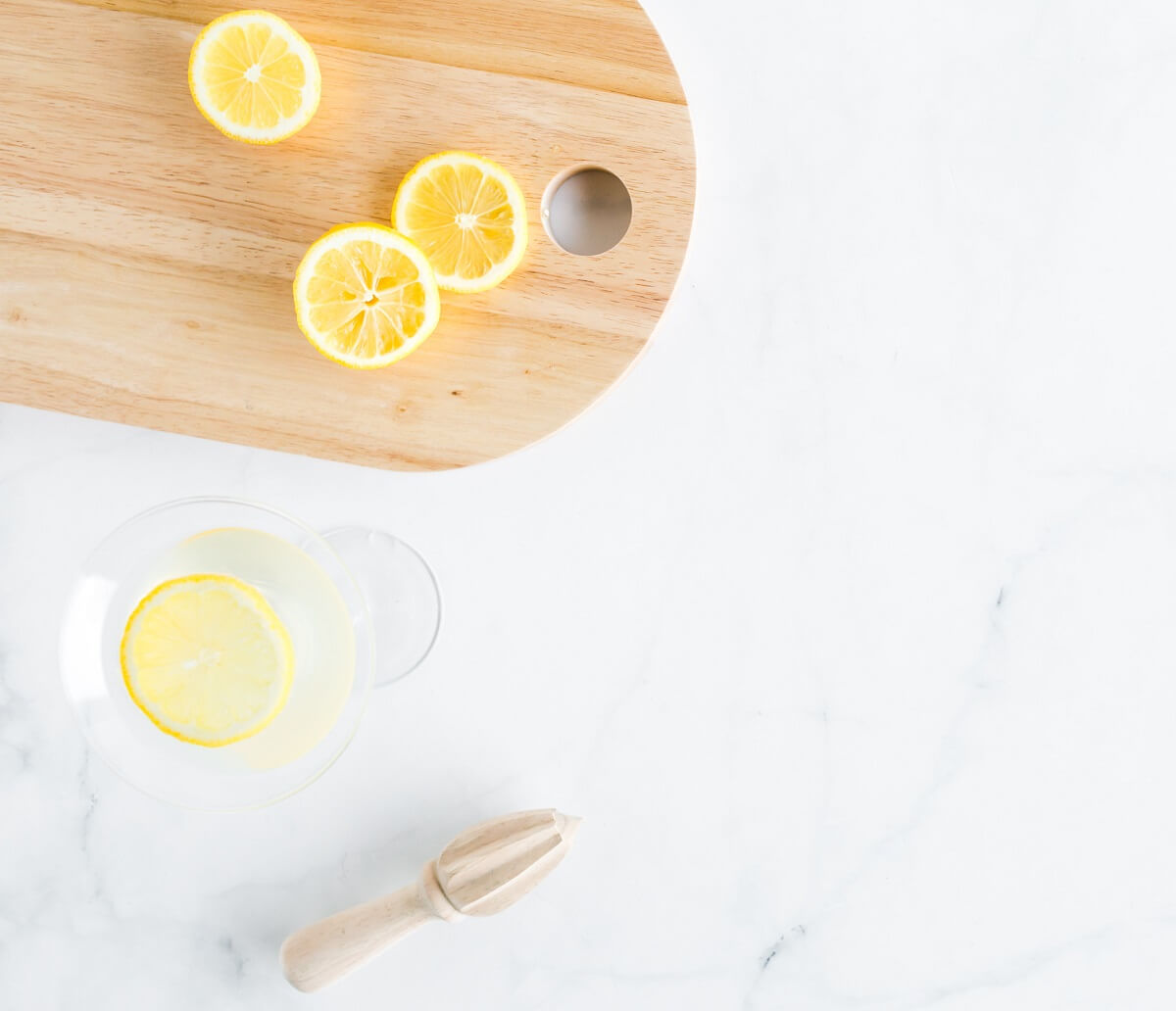 lemon on cutting board